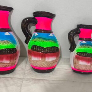 2026/06/1000281866.jpg Trio de jarrones decorativos de barro