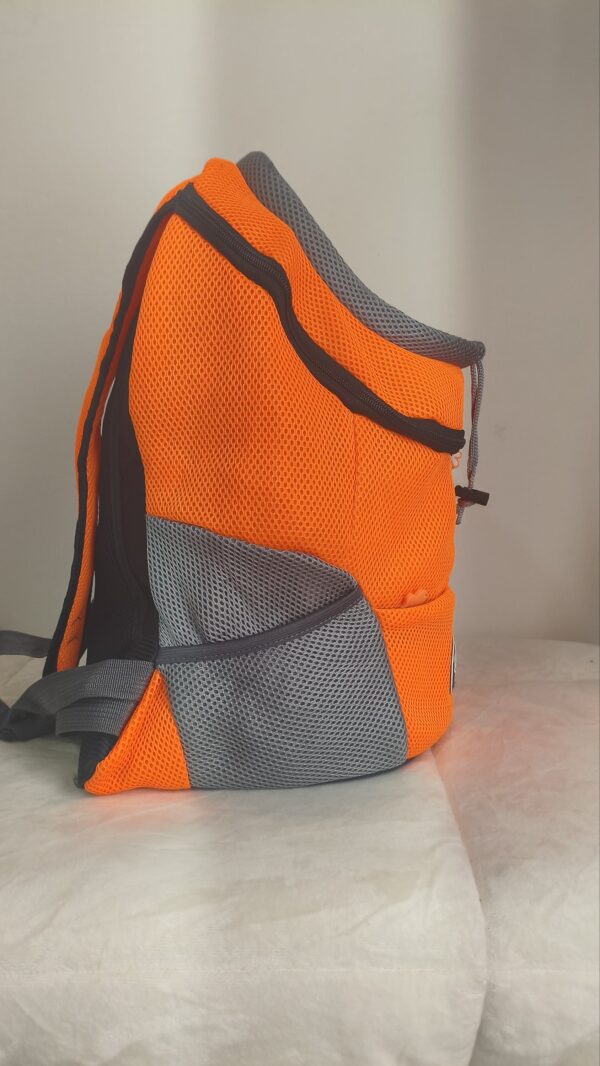 2026/06/1000294606-scaled.jpg MOCHILA PARA TRASPORTE DE MASCOTAS TRANSPIRABLE NARANJA marca: PETYFY
