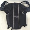 2026/09/1000372694.jpg Portabebés Mochila Canguro marca: Evenflo BabyGo de estructura blanda Negro.