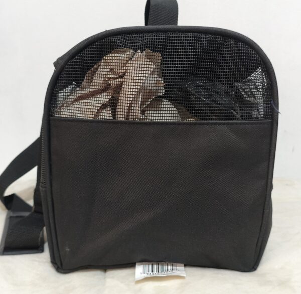 Bolso transportador de mascotas, porta mascotas en color negro.