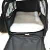 Bolso transportador de mascotas, porta mascotas en color negro.