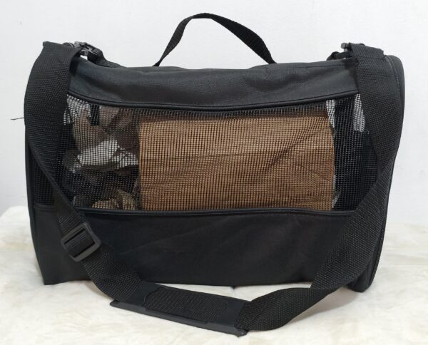 Bolso transportador de mascotas, porta mascotas en color negro.
