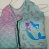chaleco de natación para niños con diseño de sirena de la marca SwimWays