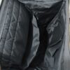 mochila y pañalera gris de lona de la marca Himawari con detalles dorados